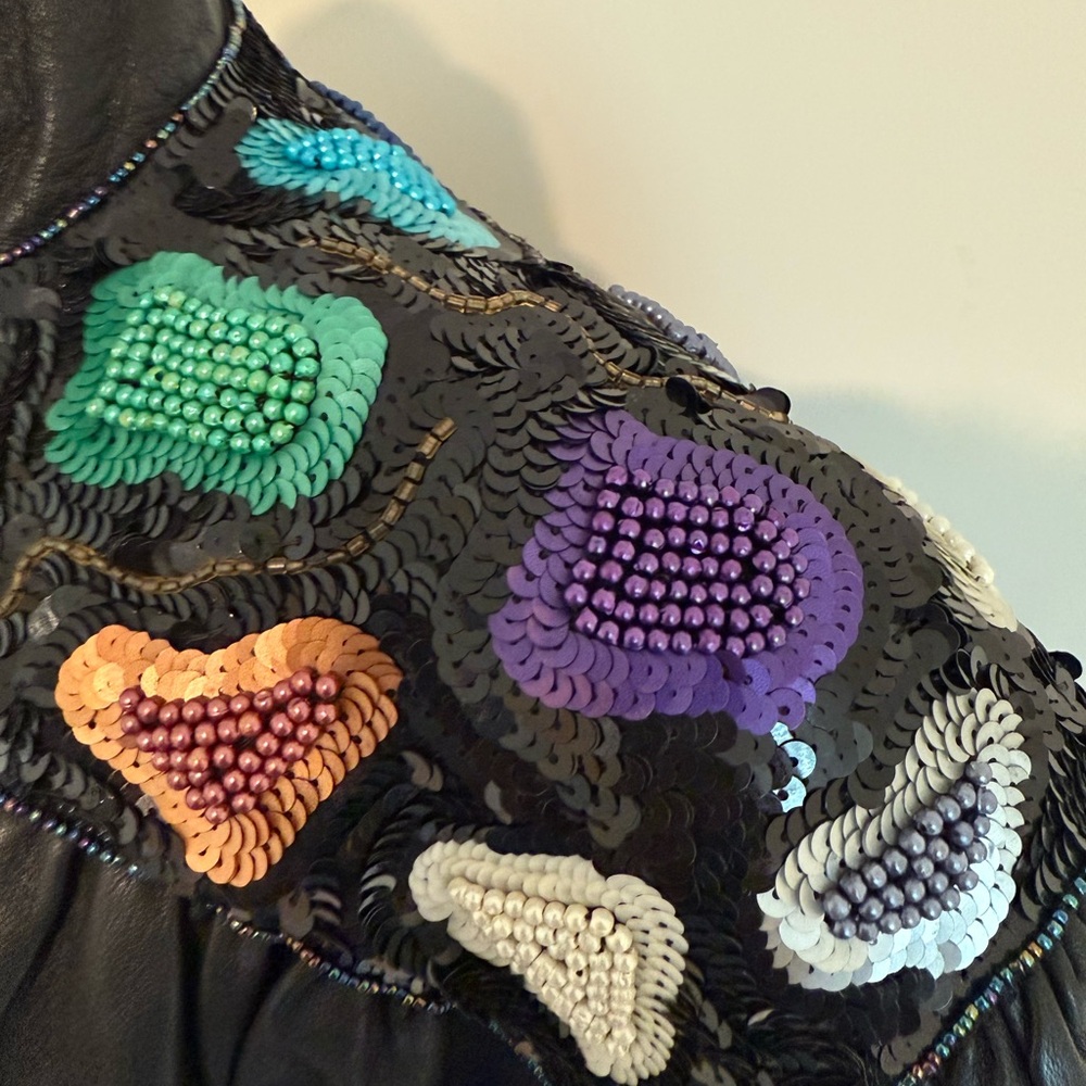Elegant Black Leather Jacket with Vibrant Accents - Picture 3 of 8